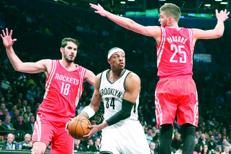 Nets shoot down Rockets, clinch playoff berth