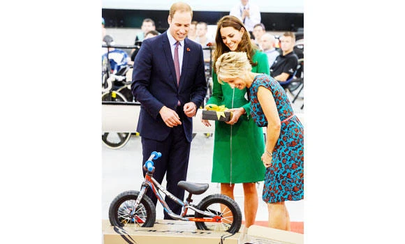 Prince George gets his first bike as mom Kate goes fact-finding