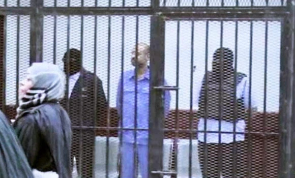 Libya trial of Qaddafi son, aides adjourned
