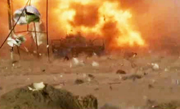 Iraq rally explosions take 18 lives