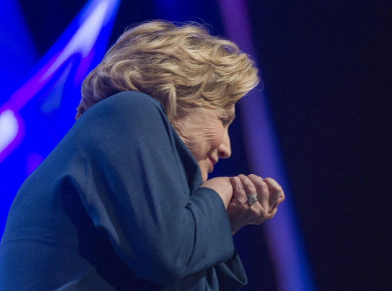 Hillary Clinton dodges shoe during Las Vegas speech