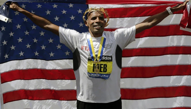 Thousands run Boston Marathon in show of defiance
