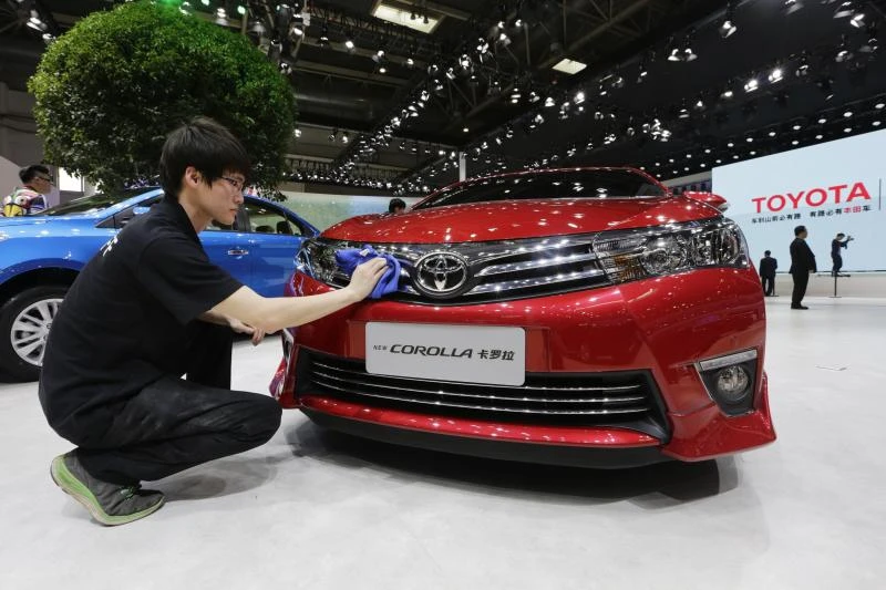 Toyota sells record 10 million vehicles in year to March