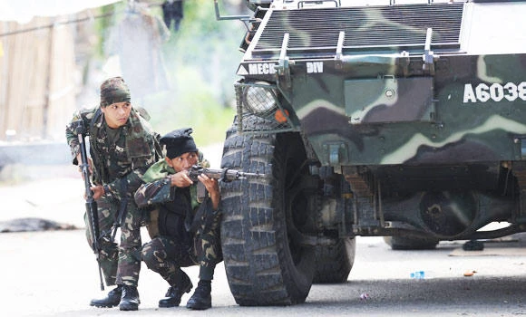 Toll hits 12 in Philippines rebel clashes