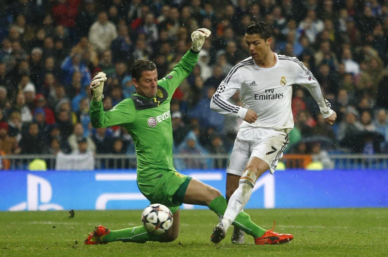 Real settles score with Dortmund; PSG shocker for Chelsea