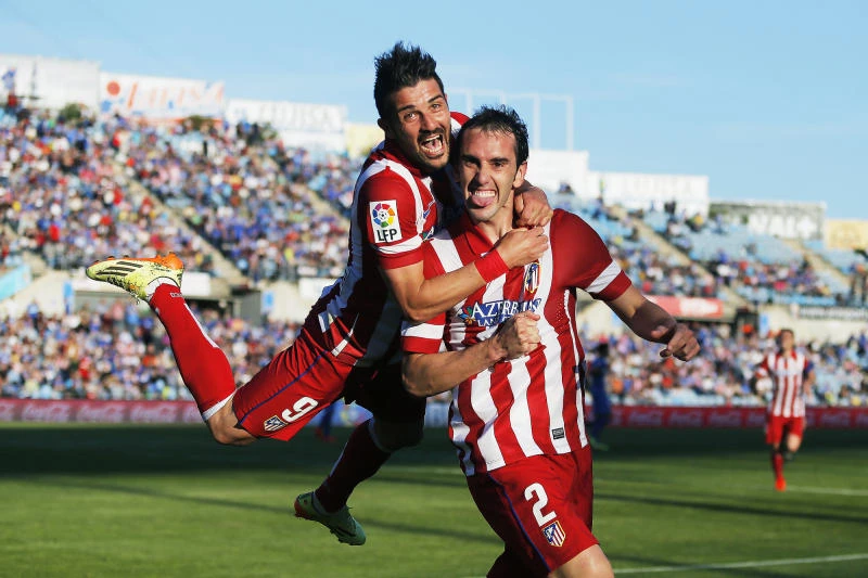 Atletico closes in on La Liga title; Costa injured