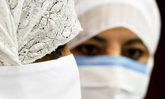 Women medical workers slam two-shift work day