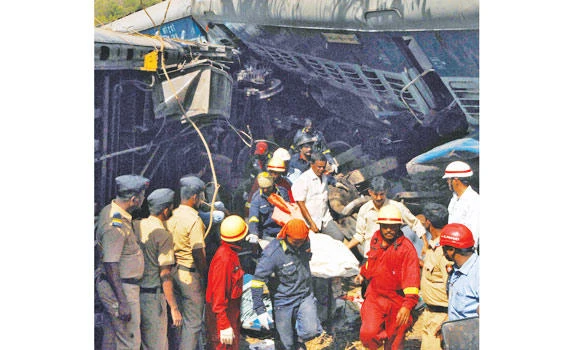 13 die as train crashes into ‘wedding’ car