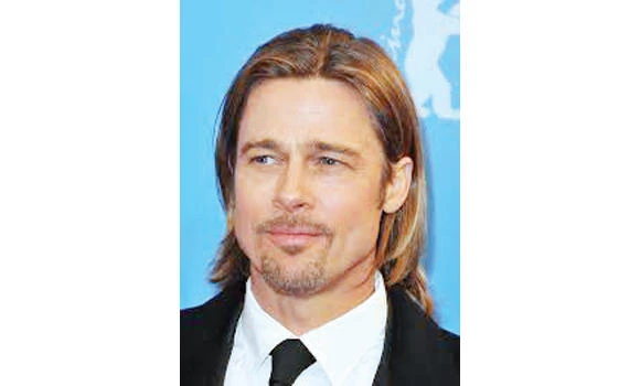 Brad Pitt buys Bieber portrait for son