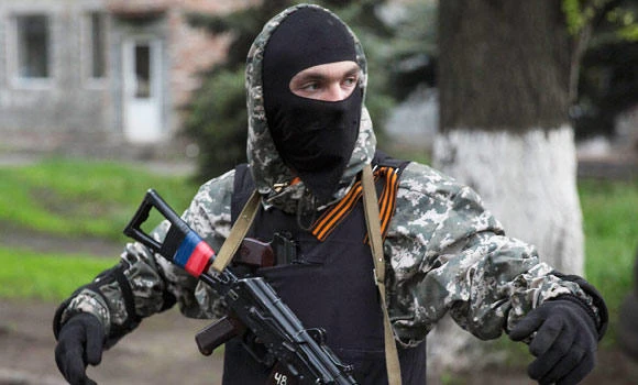 Ukraine rebels defy Putin call to press ahead with vote
