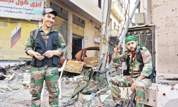Syrian troops enter old Homs as deal stalls