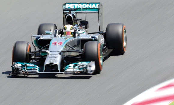 Hamilton grabs pole in Spain, Vettel’s car stalls