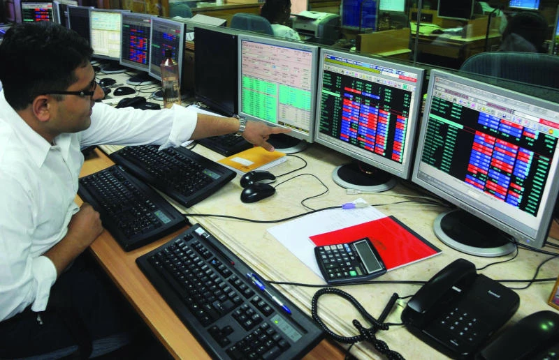 Indian rupee gains and shares rise in volatile trade