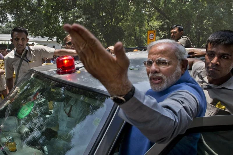 Modi gets hero's welcome as he brings new era to New Delhi