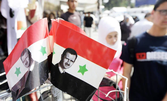 Syria says France, Germany blocking expat vote