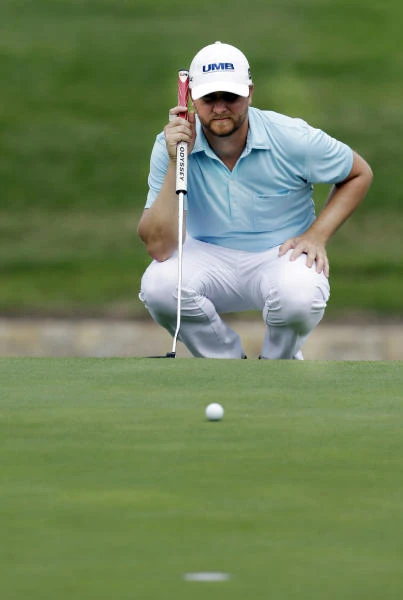 PGA Tour rookie Garnett grabs lead at Colonial
