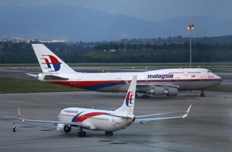 Malaysia Airlines plane struck by ground vehicle