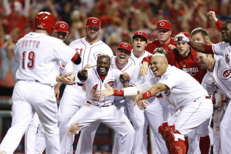 Votto homer helps Reds flatten Rockies 4-3