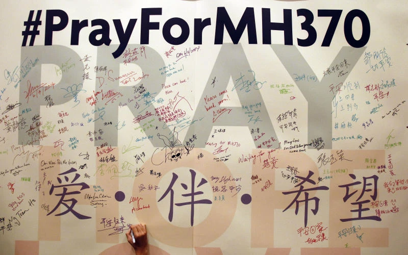 Australia rules out swathe of ocean as MH370 crash zone