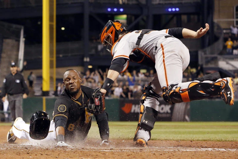 Marte call overturned, Pirates edge Giants in 9th