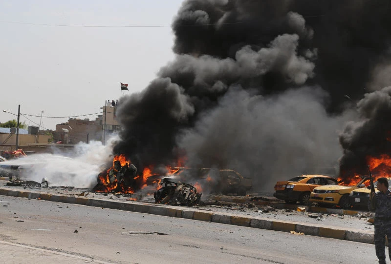 Car bomb blasts kill 34 as Iraqis await vote count