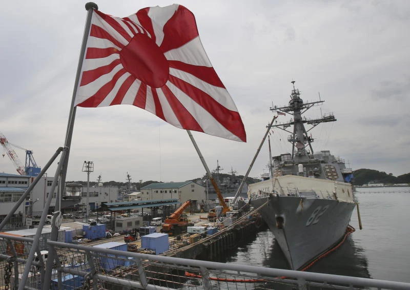 Amid Asian feuds, Japan seeks bigger security role