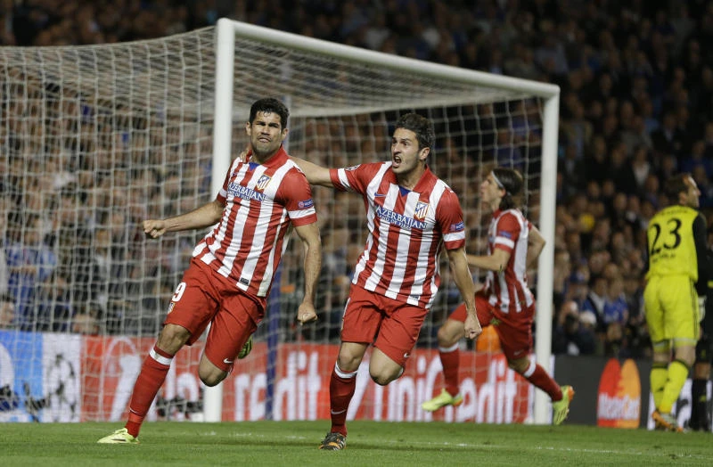 Atletico bathe in glory as Real await in final