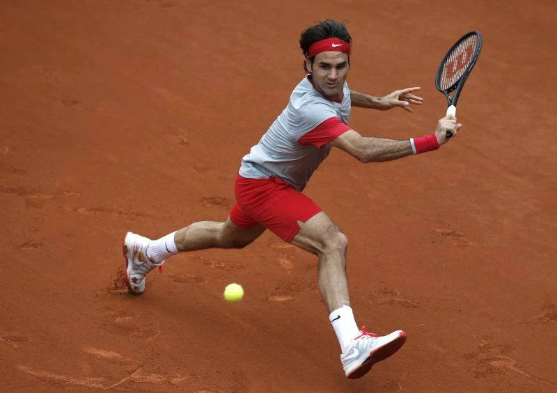Djokovic, Federer struggle through
