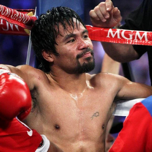 Pacquiao to fight in November, signs new contract