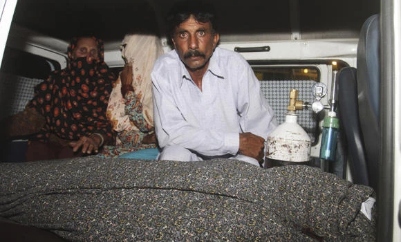 Husband of Pakistan woman beaten to death demands justice