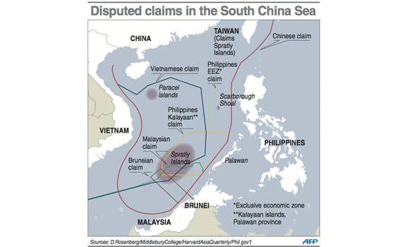 Philippines: China may be building airstrip at disputed reef
