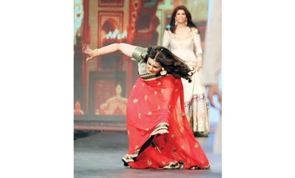 Oops! Poonam Dhillon trips on the ramp