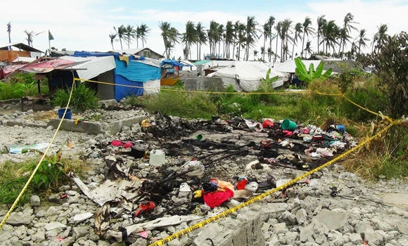 Fire kills 6 typhoon victims in Philippine tent city