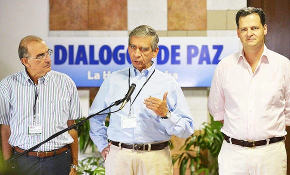 Colombian peace negotiator demands FARC hand in weapons