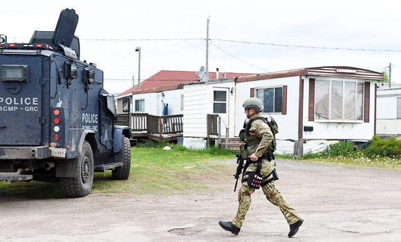 Man held for killing three police officers
