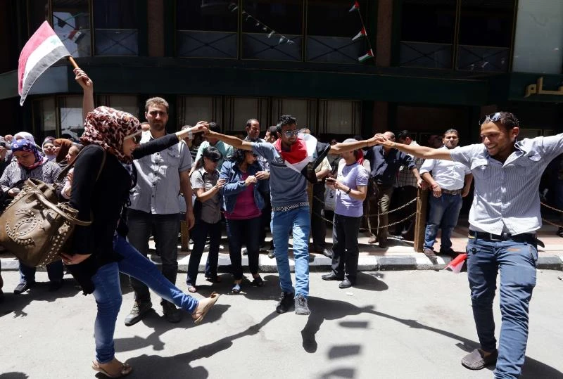 Assad win assured as only loyalists vote in 'sham' election
