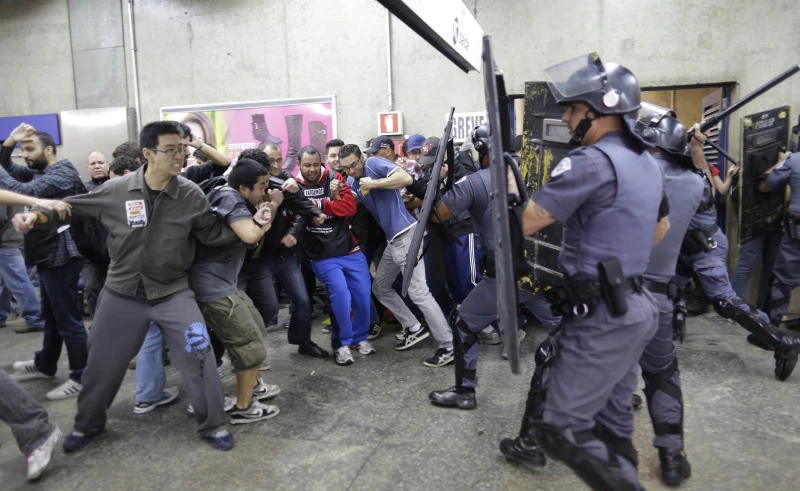 Police, strikers clash in Brazil; FIFA confident
