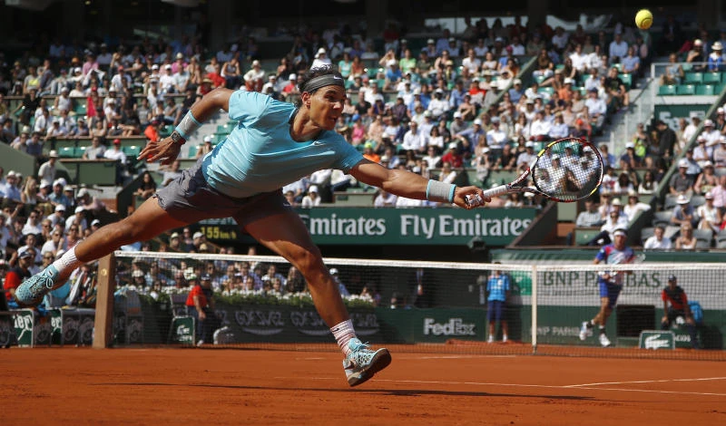 Nadal quells brief uprising to march on in Paris