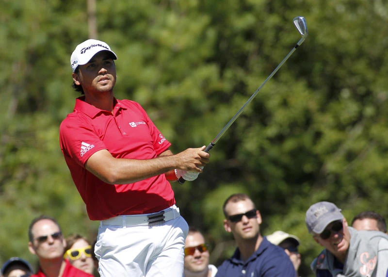 Day slows on back nine to drop into share of lead