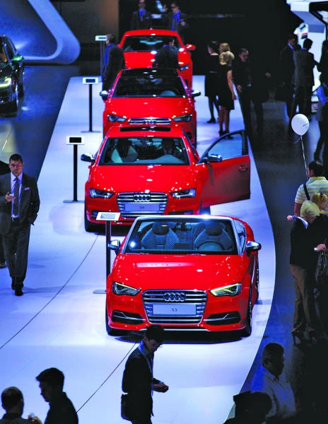 Carmakers force the smiles at Russia’s car show