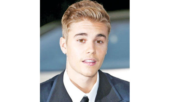 Bieber charged with assault in Canada