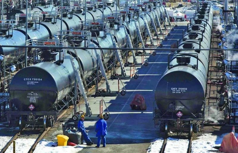 Oil falls under $100 but OPEC says price still within acceptable range