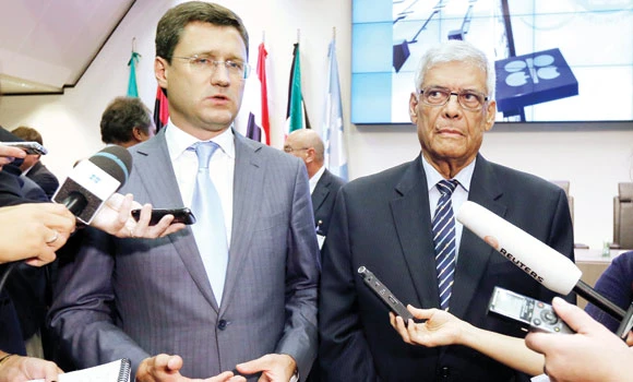 World oil prices rebound as OPEC hints at lower output