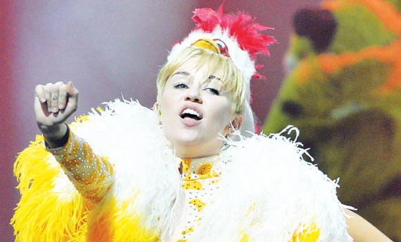 Miley show probed over flag desecration