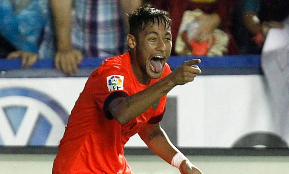 Messi leads Barca rout to keep lead; Neymar hurt