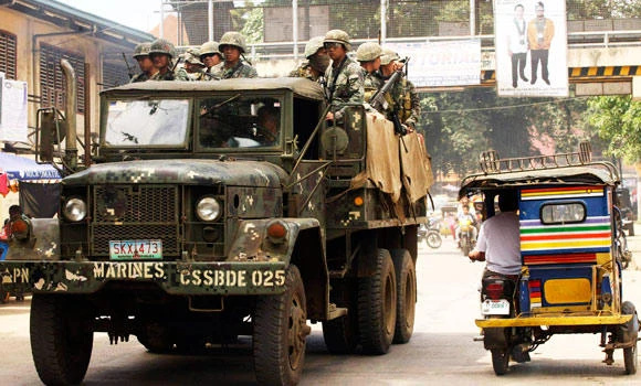 Philippine rebels start difficult disarming process