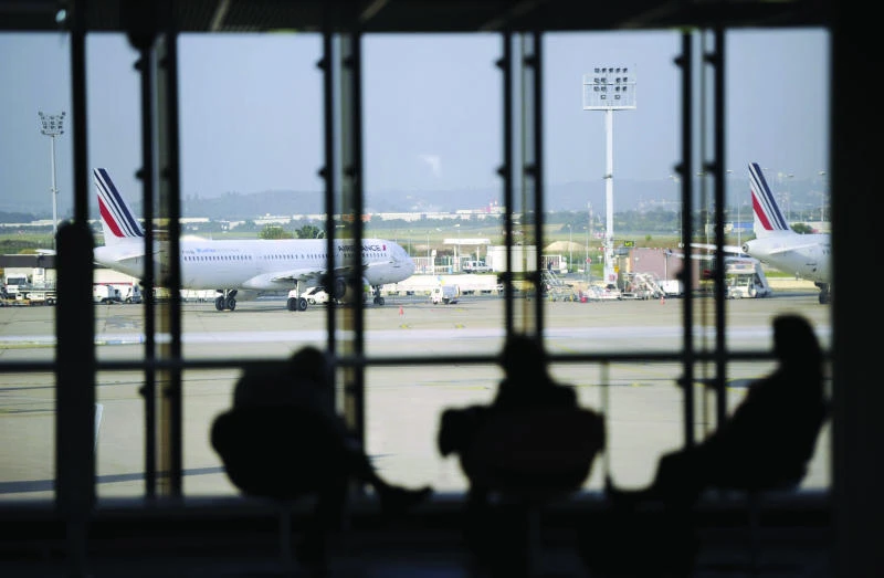 Airlines fly slower to cut fuel bill