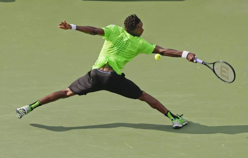 Following his own rules, Monfils into quarterfinals