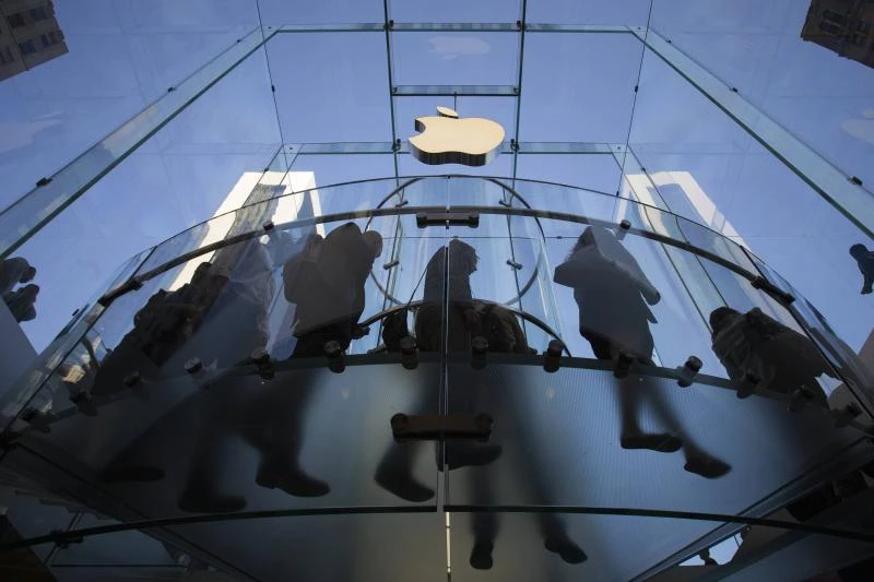 Apple faithful line up for latest, larger iPhones