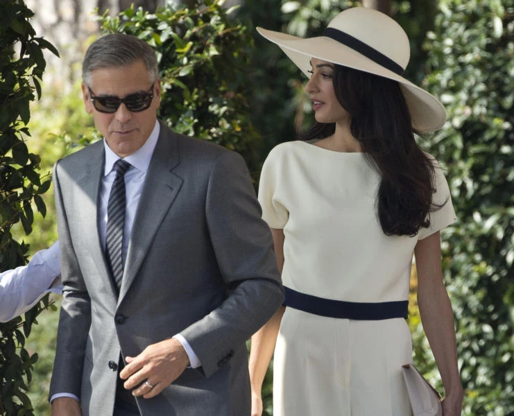 'That dress' designer revealed as Mrs. Clooney shows fashion force